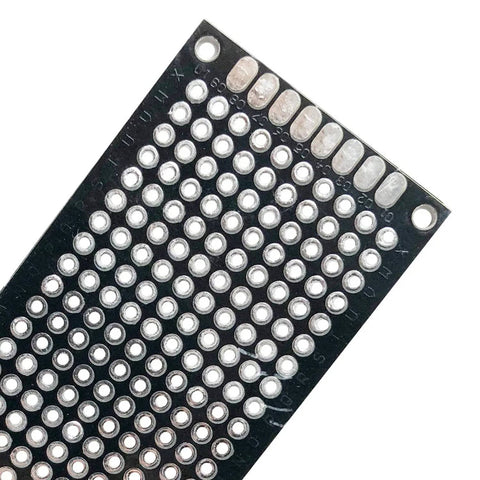 Close-up of PCB board with pre-tinned holes from 38 Pcs Double Sided PCB Prototyping Kit With Five Sizes And Pre Tin Plated Holes.