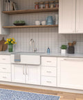 Kitchen with installed Solid Core Stainless Steel Cabinet Pulls, 5-1/16 Inch Hole Center, 128mm, Greenwich Collection handles.