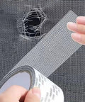 Self Adhering Window Screen Repair Tape For Torn Screens being applied to a damaged window mesh, showing self-adhesive feature.