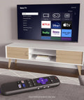 Replacement TV Remote For Roku TV Models Only With No Fuss Setup And Pre Set App Shortcuts Official Manufacturer Quality Remote shown on table