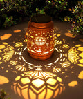 Hot Air Balloon Solar Lanterns For Outdoors Retro Vibe Waterproof Hanging LED Light casting patterns on garden ground
