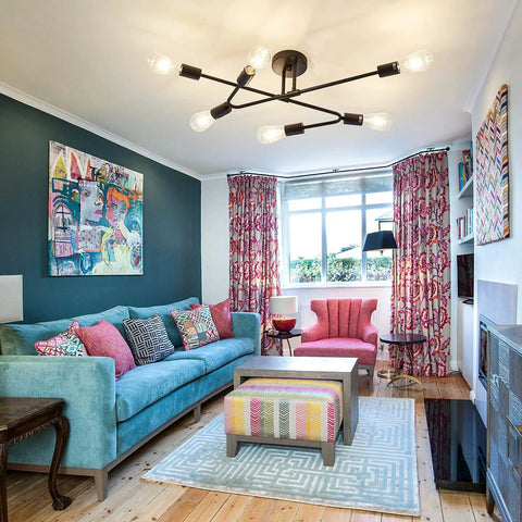 Living room with Six Light Vintage Sputnik Chandelier in Matte Black Metal Semi Flush Mount Ceiling Light Fixture overhead