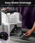 Top Tier Nugget Ice Maker Producing Thirty Three Pounds Daily Of Crisp Chewable Crushed Ice With Easy Self Cleaning Setup And Clear Viewing Window demonstrating easy water drainage feature.