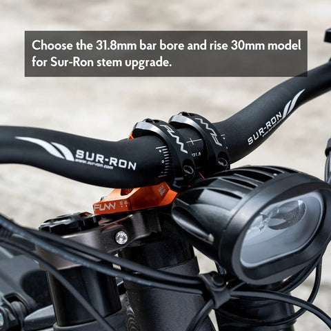 Close-up of RSX Direct Mount Mountain Bike Stem for 31.8mm bars in black, showcasing lightweight split design on dual crown forks.