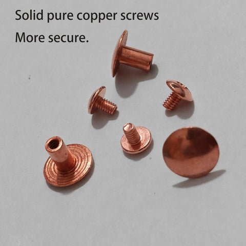 Pro Grade Men's Grounding Socks Accessory Bundle With Eight Real Pure Copper Solid Earthing Screws showing five screws on a white surface.
