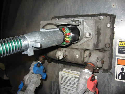 7 Way Round Pin Tractor Trailer Circuit Chaser On Road Testing Tool plugged into trailer for diagnostics