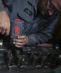 Beast Three Quarter Inch Drive Air Impact Wrench With Up To 2000 Ft-Lbs Nut Busting Torque, Heavy Duty Auto Shop Tool For Automotive And Industrial Jobs, Comfortable Grip, Air Tool Only in use on engine head