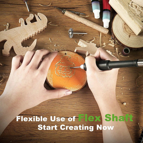 Hands using Straight Up Powerhouse 12V Cordless Rotary Tool With Keyless Chuck And Flex Shaft for wood carving on orange wood slice.
