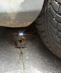 Telescoping Swiveling Inspection Mirror Tool With Twin White LED Lights in use under vehicle for inspection