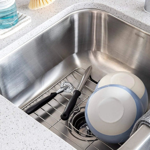 Stainless Steel Sink Protector Grid 12 X 10.25 Inch rust-resistant non-slip rack with kitchen dishes and utensils in sink
