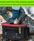 Foldable 6 Gallon EVA Fishing Bucket With Breathable Zippered Net Top holding a fish near water, showcasing portable use