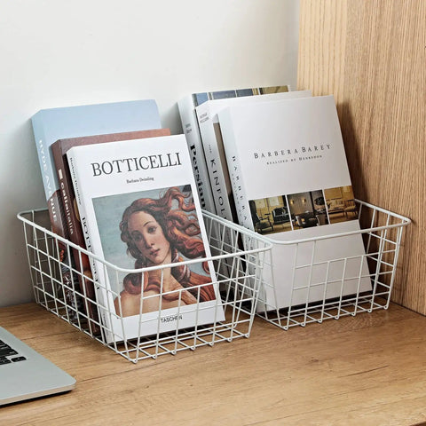 Set Of 4 White Wire Storage Baskets For Freezer, Pantry, And Bathroom Organization on desk holding books