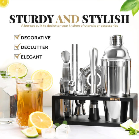 Ultimate Home Bar Mixology Kit With Stand 15 Piece Silver Bar Tool Set for Crafting Dope Cocktails at Home on display with drinks