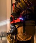 Firefighter holding Vulcan 180 Lantern Cranks Out 1200 Lumens With 548M Beam, 180-Degree Articulating Head That Locks Forward