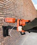 Diamond Core Drilling Machine With Bit For Wet Concrete Heavy Duty 8 Inch Core Drill Rig With Stand Wheel 750 RPM in use on brick wall
