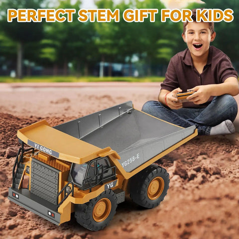 Child playing with Remote Control Dump Truck For Kids Nine Channel RC Construction Vehicle With Metal Dump Bed outdoors
