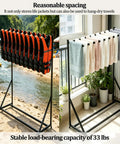 Heavy Duty Two Tier Pool Drying Rack With Swivel Casters For Easy Mobility holding life jackets and towels, sturdy iron construction.