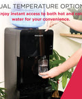 Person using Top Loading Water Cooler Dispenser With Hot And Cold Water And Child Safety Lock Freestanding Slim Space Saving Design For Home Or Office No Fuss 3 Or 5 Gallon Bottles Black to fill cup