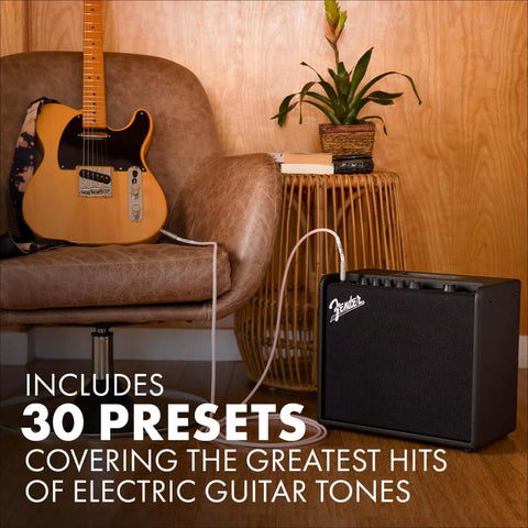 Mustang LT25 Guitar Amplifier 25 Watt Digital Modeling Combo Amp With 8 Inch Speaker and 30 Presets next to guitar and chair