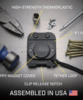 Magnetic Tool Holder Clip On Belt Holster; black thermoplastic, magnet cover, tether loop, surrounded by tools; assembled in USA