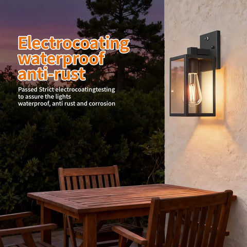 Dusk To Dawn Outdoor Wall Light With Automatic Sensor Solid Black Metal Coach Lantern Waterproof Porch Fixture mounted on wall beside wooden table.