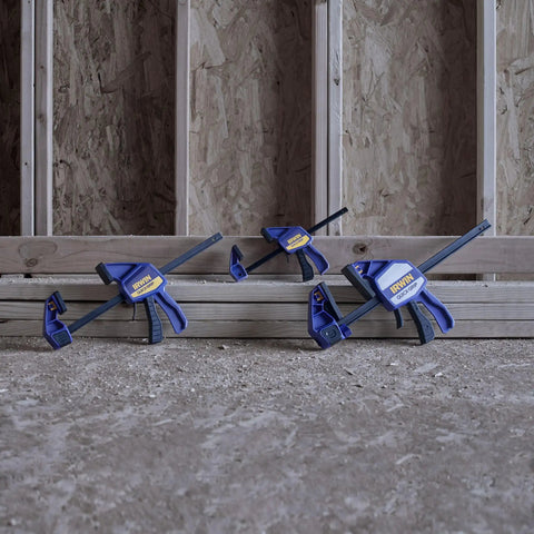 Three One-Handed Quick-Change Bar Clamps For Medium-Duty Projects, 12 Inch, 300 Lbs Clamping Pressure, on wooden frame.