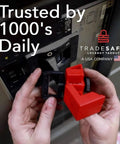 Person installing Heavy Duty Clamp-On Circuit Breaker Lockout Device Kit, 3 Pack, 480 and 600 Volt on electrical panel.