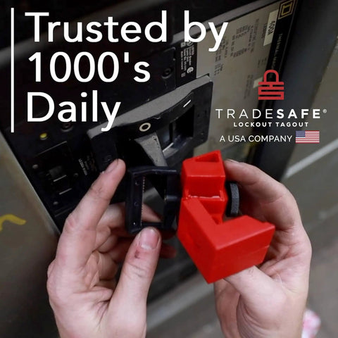 Person installing Heavy Duty Clamp-On Circuit Breaker Lockout Device Kit, 3 Pack, 480 and 600 Volt on electrical panel.