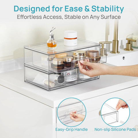 Clear Stackable Storage Drawers 2 Pack Wide Plastic Organizers on bathroom counter with easy-grip handle and cosmetics.