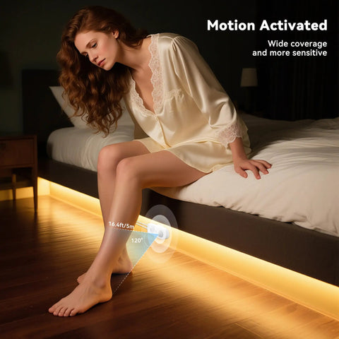 Woman using Motion Activated LED Dimmer Controller With PIR Sensor under bed lighting setup