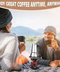 Couple enjoying coffee with Four Cup Moka Pot Stovetop Espresso Maker in 304 Stainless Steel, induction compatible, outdoors.