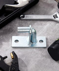 Heavy Duty 8 Piece Wall Mount Gate Hinges With 5/8 Inch Steel Pin For Farm Gates And Outdoor Chain Link Fences Built Like A Tank To Handle Rough Use Without A Bit Of Fuss  angle showing hinge on a work surface.