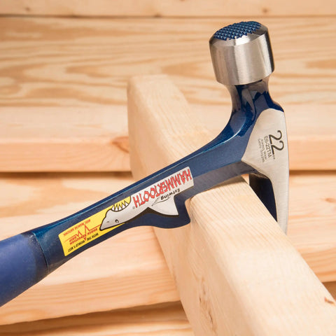 Hammertooth Hammer 22 oz USA Made Straight Rip Claw Hammer With Milled Face And Shock Reduction Grip on wooden board