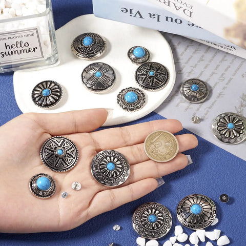 Hand holding assorted Badass Vintage Turquoise Screw Back Concho Kit for Leather Work and Fabric Sewing 22 Assorted Styles.