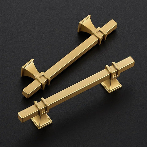Heavy Duty Gold Cabinet Pulls And Drawer Handles Offering A Slick Upgrade For Kitchens And Baths Durable Stainless Steel And Zinc Alloy Base Plus Four Inch Center Spacing Anti Tarnish Coating Makes This Five Pack A Top Shelf Home Renovation Essential, featuring two stylish handles.
