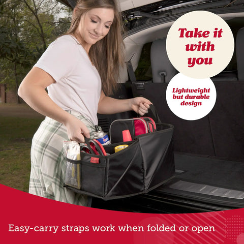Woman carrying Backseat Car Organizer With Built In Cup Holders And Mesh Pockets, folding in black Oxford finish with 9 compartments.