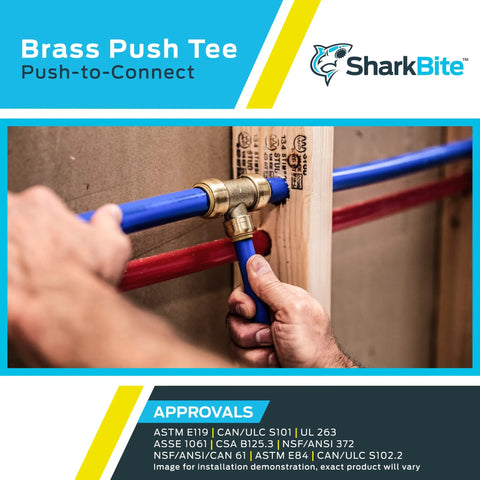Brass Push To Connect Tee Fitting For Plumbing Quick Installation in use with blue and red pipes on wooden frame.