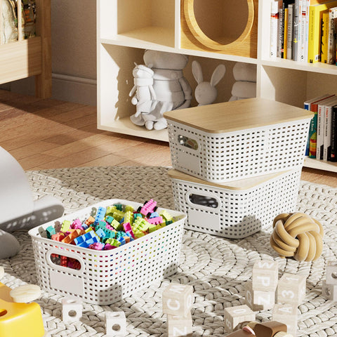 Six Pack Stackable Plastic Storage Bins With Lids And Bamboo Lid in a playroom with toys, 10x7.1x4.1 inches, organized on a carpet.