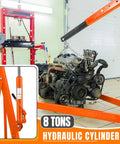 Heavy Duty Folding Hydraulic Engine Hoist Featuring Smooth Pump Operation And Knockout Lifting Capacity For Any Home Garage Shop Rig that lifts an engine.
