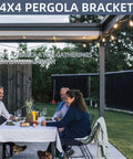 People gathering under a pergola with 3-Way Right Angle Pergola Corner Bracket Kit, 4x4 Inch, 4 Pack With Screws installed.