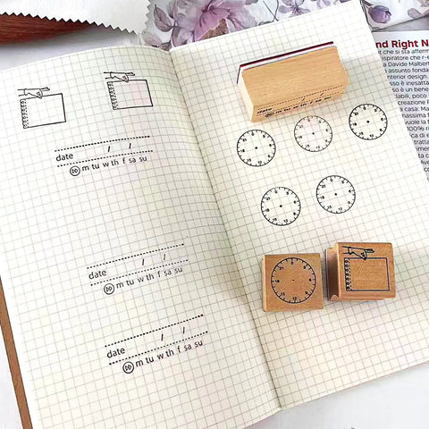 Top Shelf Wooden Stamp Set Featuring Date Time Notes Stamps For Crafting Journaling Planner Organization Durable Natural Wood And Rubber Design Super Slick Ink Application Killer Combo, showing stamps on notebook.