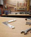 Inside Corner Brackets 100 Pack L Shaped Furniture Reinforcement Braces For Woodworking, silver support on workbench