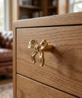 Top Shelf Vintage Bowknot Cabinet Knobs And Metal Drawer Pulls For Furniture Hardware Decorative Rustic Handles With Smooth Action Surefire Grip Small Knobs For Cupboards And Dressers, close-up of gold bowknot knob on wooden cabinet.