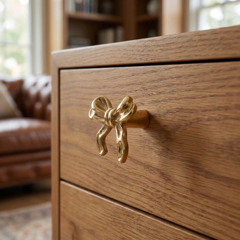 Top Shelf Vintage Bowknot Cabinet Knobs And Metal Drawer Pulls For Furniture Hardware Decorative Rustic Handles With Smooth Action Surefire Grip Small Knobs For Cupboards And Dressers, close-up of gold bowknot knob on wooden cabinet.