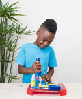 Child using Space Circuits Beginner Circuit Building Kit For Kids 52 Piece STEM Toy With Kid Friendly Drill and missions.