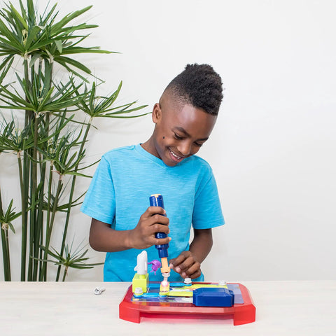 Child using Space Circuits Beginner Circuit Building Kit For Kids 52 Piece STEM Toy With Kid Friendly Drill and missions.