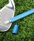 Groove Sharpener For Golf Clubs Re Grooving Tool in Blue Next to Wedge Iron on Grass Restores Performance for U and V Grooves