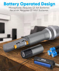 Dual UHF Wireless Microphone System with battery compartment open, showing AA batteries, receiver, and USB port on a table