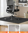 Heavy Duty Office Chair Mat For Hardwood And Tile Floors, Non Slip Rolling Chair Floor Protector, 36 By 48 Inch Computer Desk Mat For Work, Study, And Home Office, Waterproof And Oil Resistant, Black shown under office chair at desk.