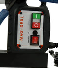 Close-up of Badass Magnetic Drill With Integrated Knock Out Mode For Serious Construction Grinds power controls and shank.